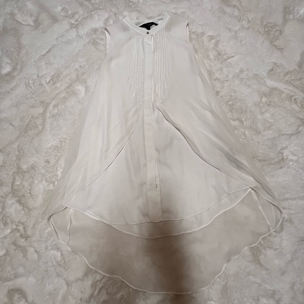 White House Black Market sleeveless blouse.